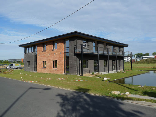 commercial building by lake